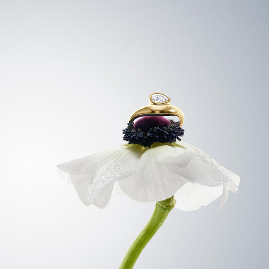 The Bezel Pear Wave Ring