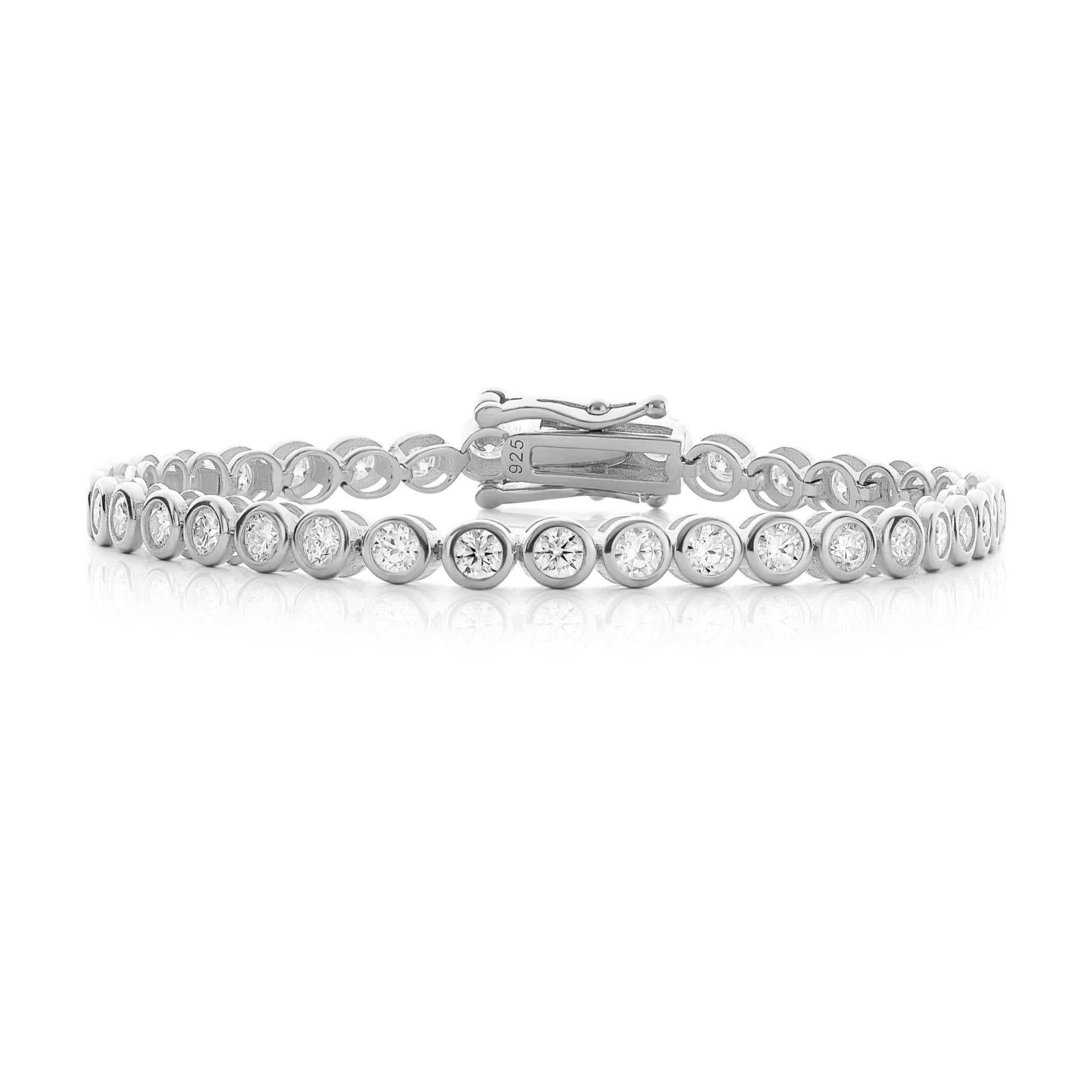 Silver bracelet with clear stones on a white background